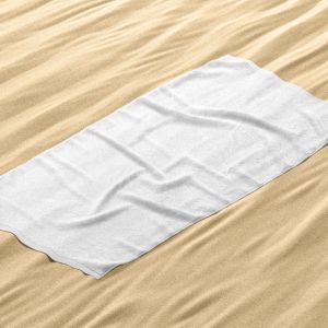 big unfolded crumpled towel on sand mockup side view